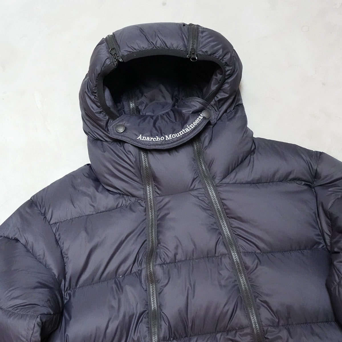 【Mountain Research】マウンテンリサーチ 4 Zips Down Parka "Black"