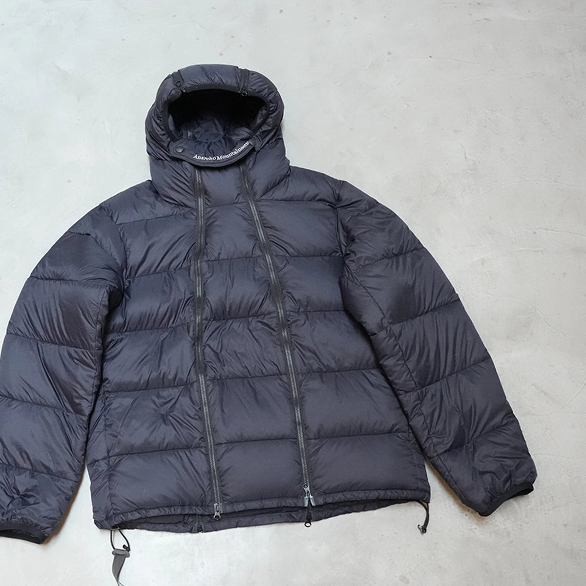 【Mountain Research】マウンテンリサーチ 4 Zips Down Parka "Black"