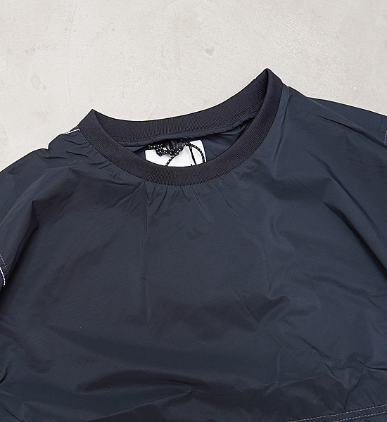 【and wander】アンドワンダー women's PERTEX wind T "2Color"