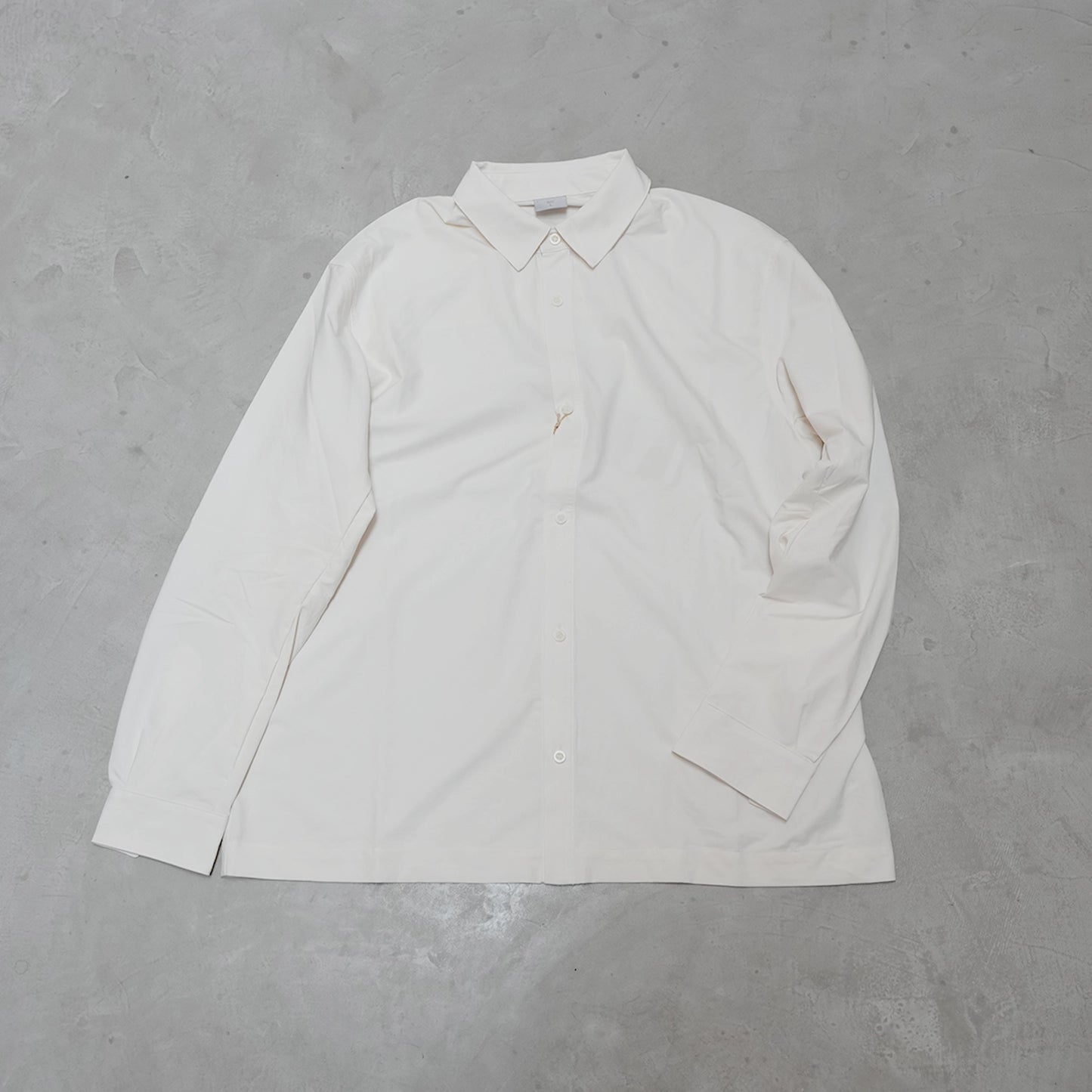 【HOUDINI】フーディニ men's Symbio Base Shirt "Paper White"