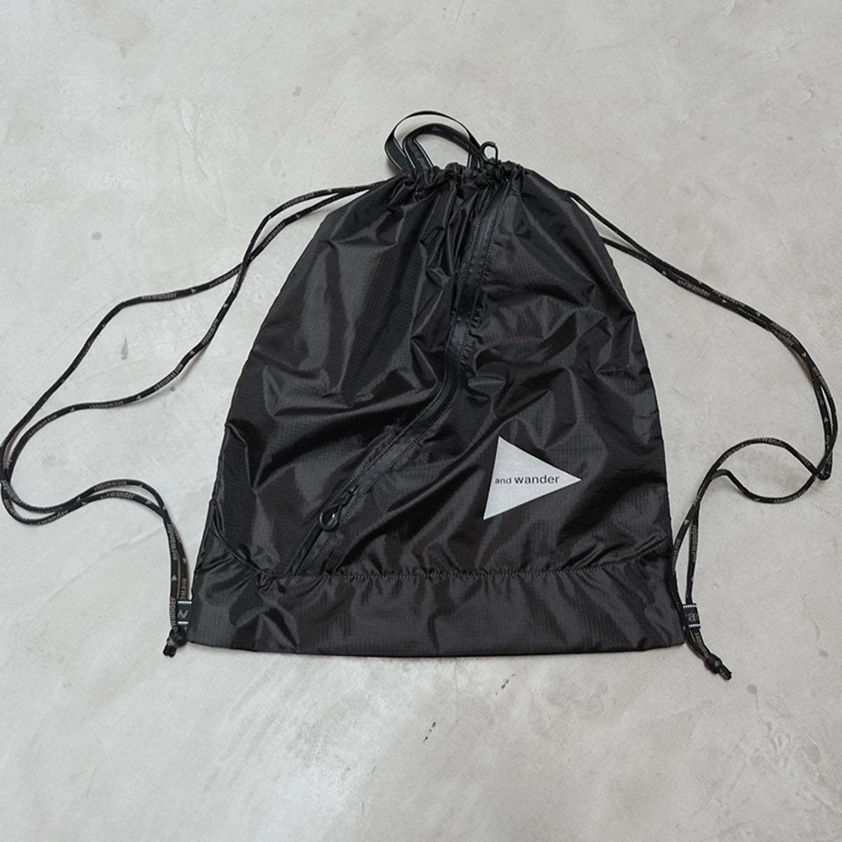 【and wander】アンドワンダー crispy rip drawstring bag "2Color" ※ネコポス可