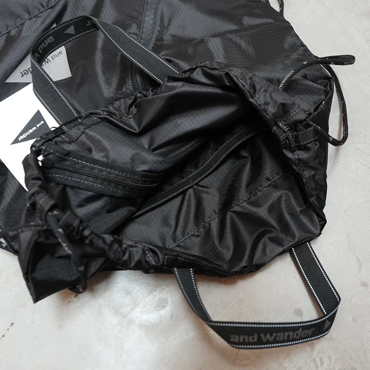 【and wander】アンドワンダー crispy rip drawstring bag "2Color" ※ネコポス可