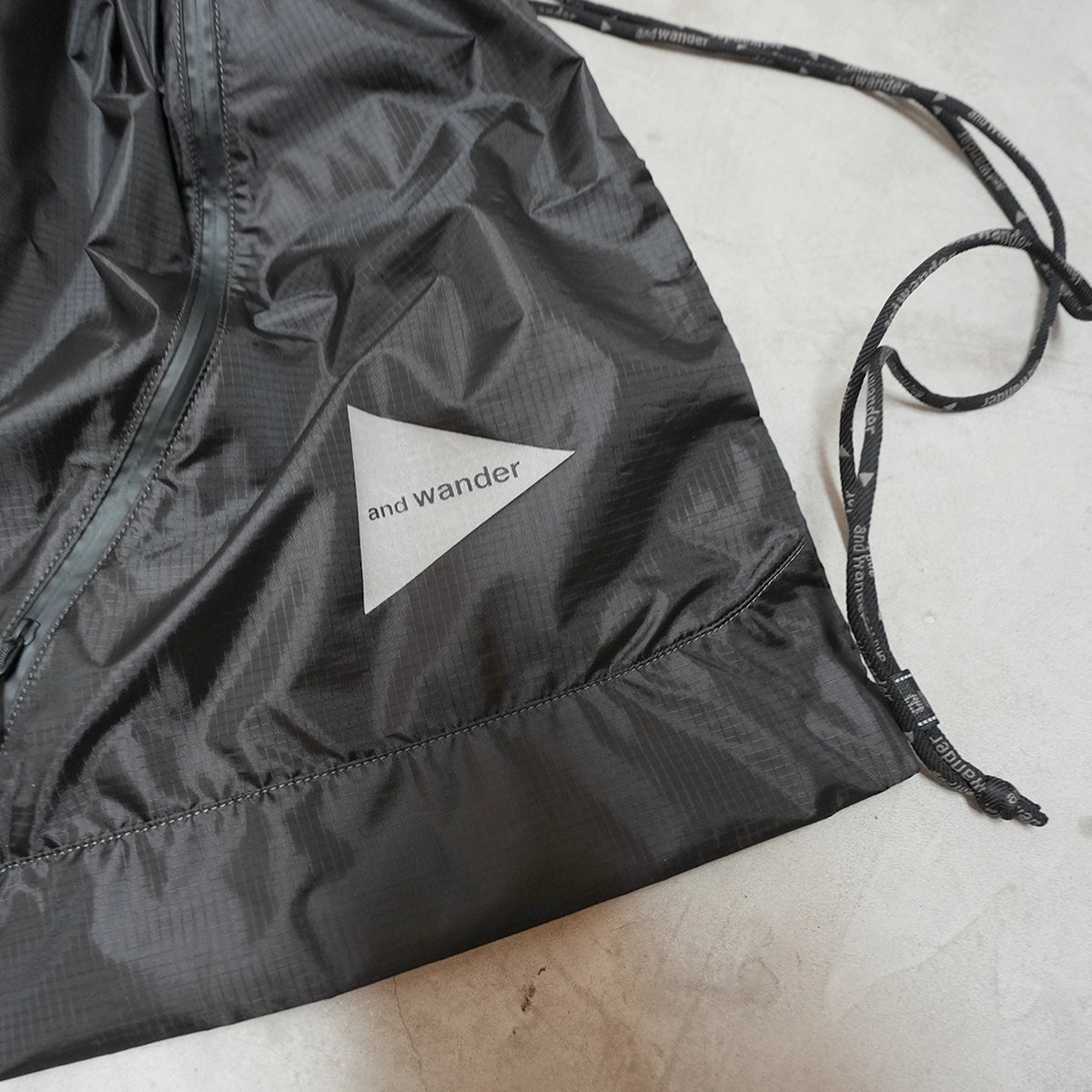 【and wander】アンドワンダー crispy rip drawstring bag "2Color" ※ネコポス可