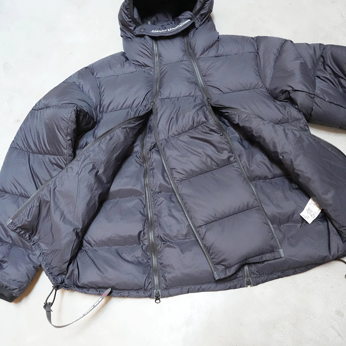 【Mountain Research】マウンテンリサーチ 4 Zips Down Parka "Black"