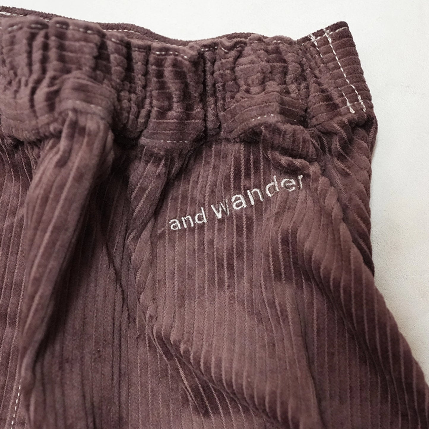 【and wander】アンドワンダー women's corduroy skirt "2Color"
