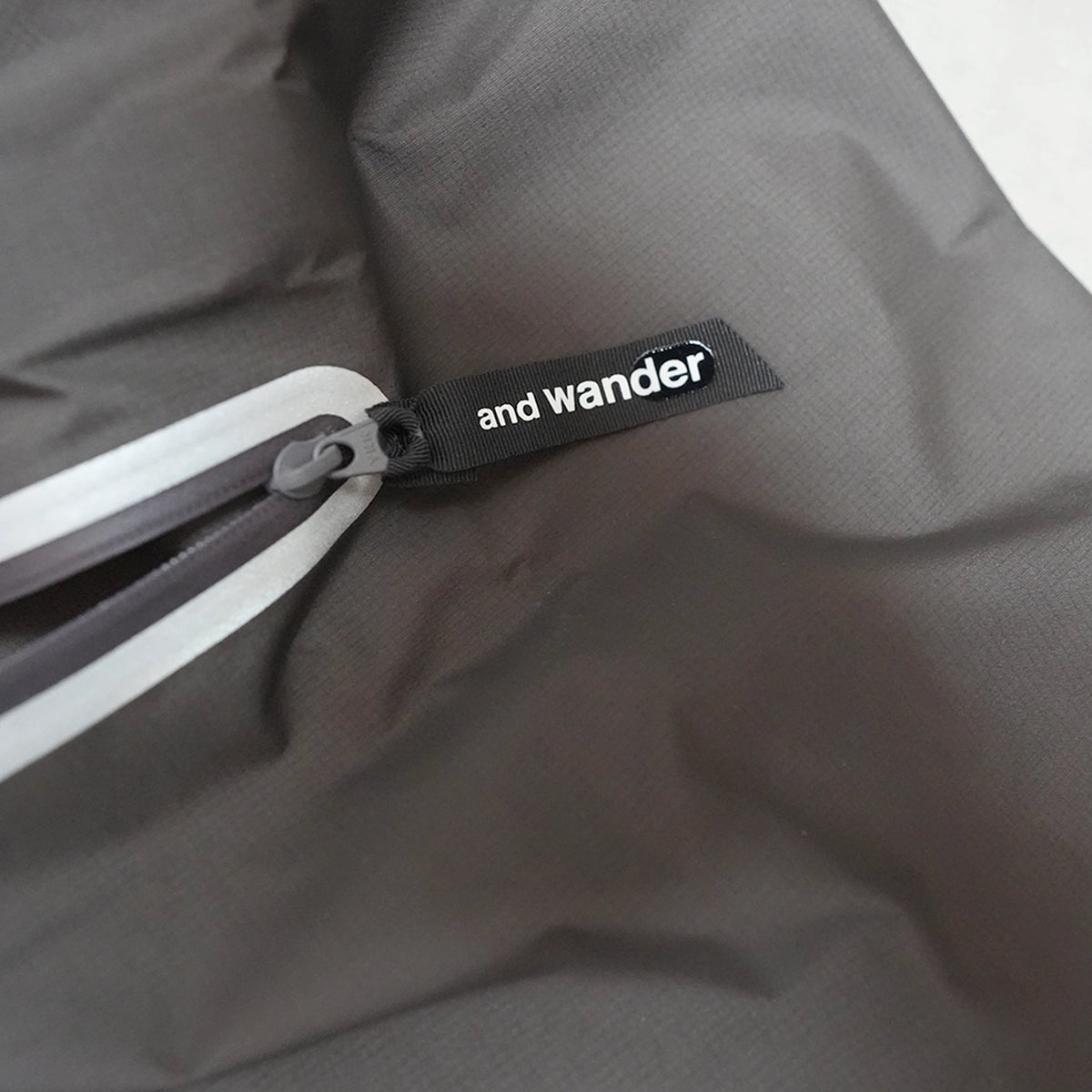 【and wander】アンドワンダー rain wrap skirt "Charcoal"