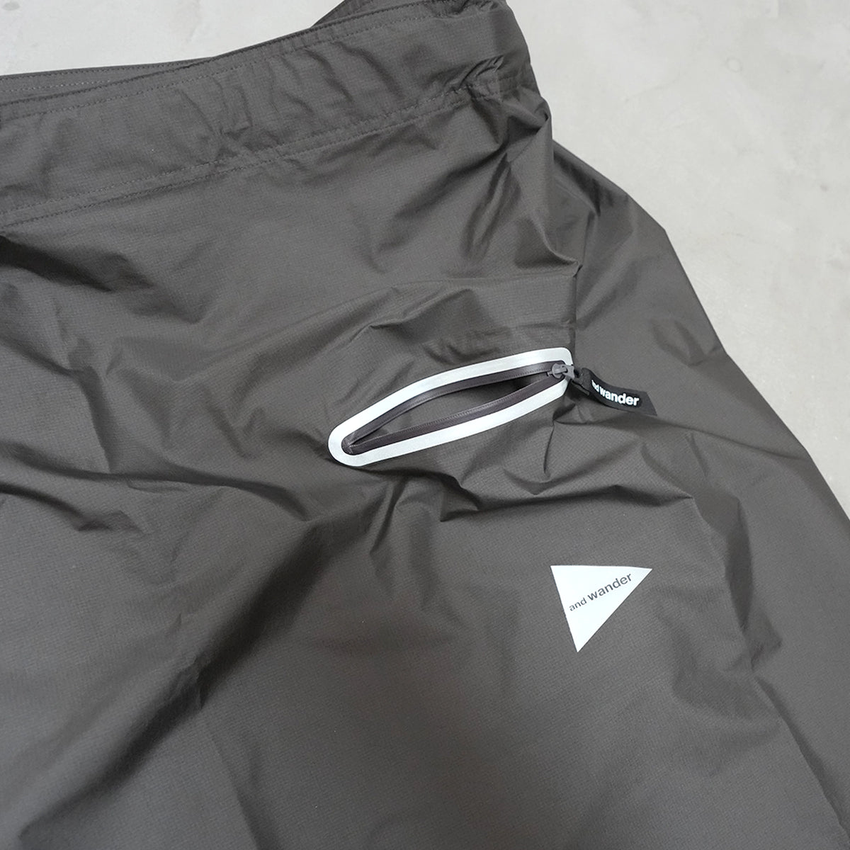 【and wander】アンドワンダー rain wrap skirt "Charcoal"