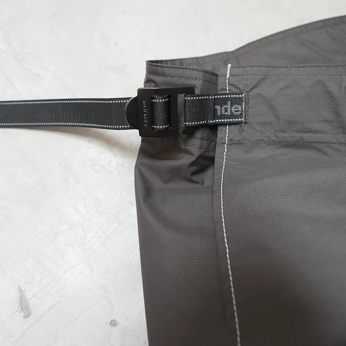 【and wander】アンドワンダー rain wrap skirt "Charcoal"